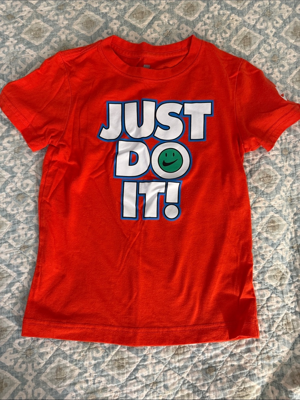 Nike Orange 'Just Do It!' Graphic Tee with Green Smiley